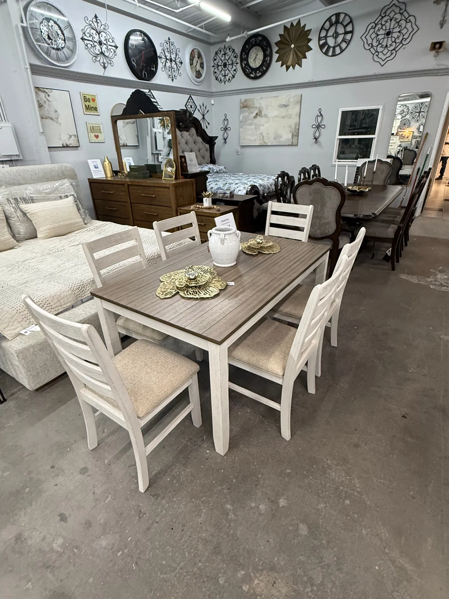 Dining and bedroom showroom at Deals4Less Spruce