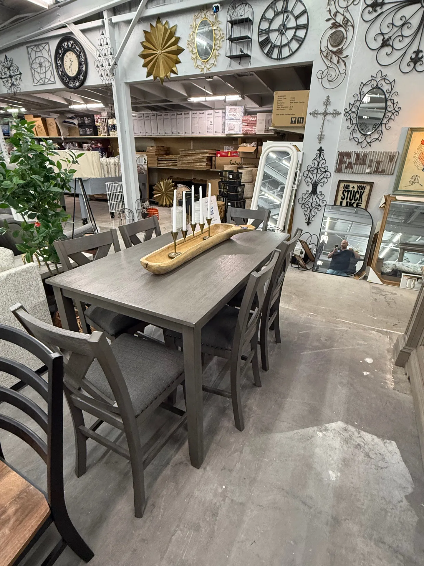 Gray dining table set with wall decor at Deals4Less Spruce